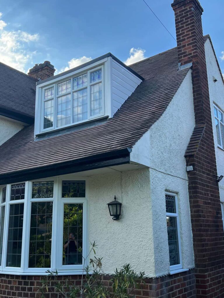 This is a photo of a dormer window which has just had some repairs carried out where the roof and the dormer meet. Works carried out by Stapleford Roofing Repairs